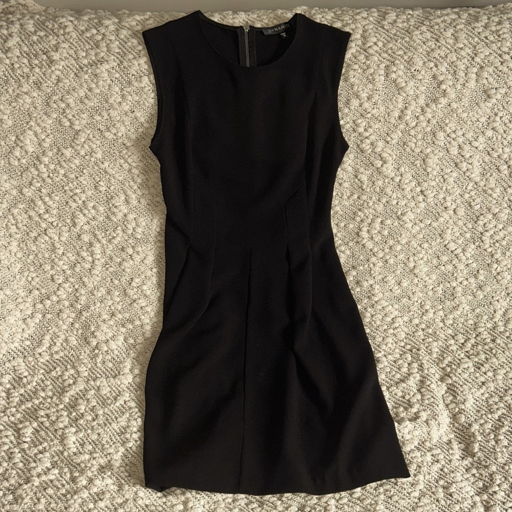 Black dynamite dress looks and feels like beautiful crepe material